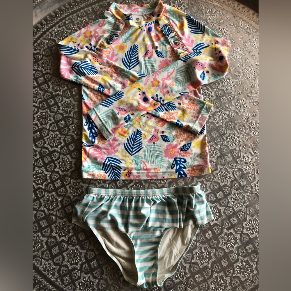 Ticket + Tate rash guard top and ruffle bottom